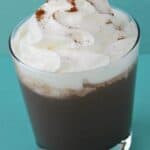 Homemade Chocolate Eggnog (Easter Cocktail) in a glass with whipped cream