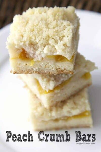 Peach Crumb Bars stacked on plate