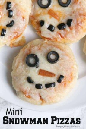 Mini Snowman Pizzas - an easy kid friendly pizza recipe perfect for winter! SnappyGourmet.com