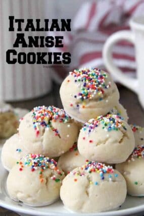 Glazed Italian Anise Cookies with sprinkles on plate