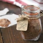chicken taco seasoning in glass jar with gift tag