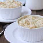 two Individual Chicken Pot Pies on ramekins on plates