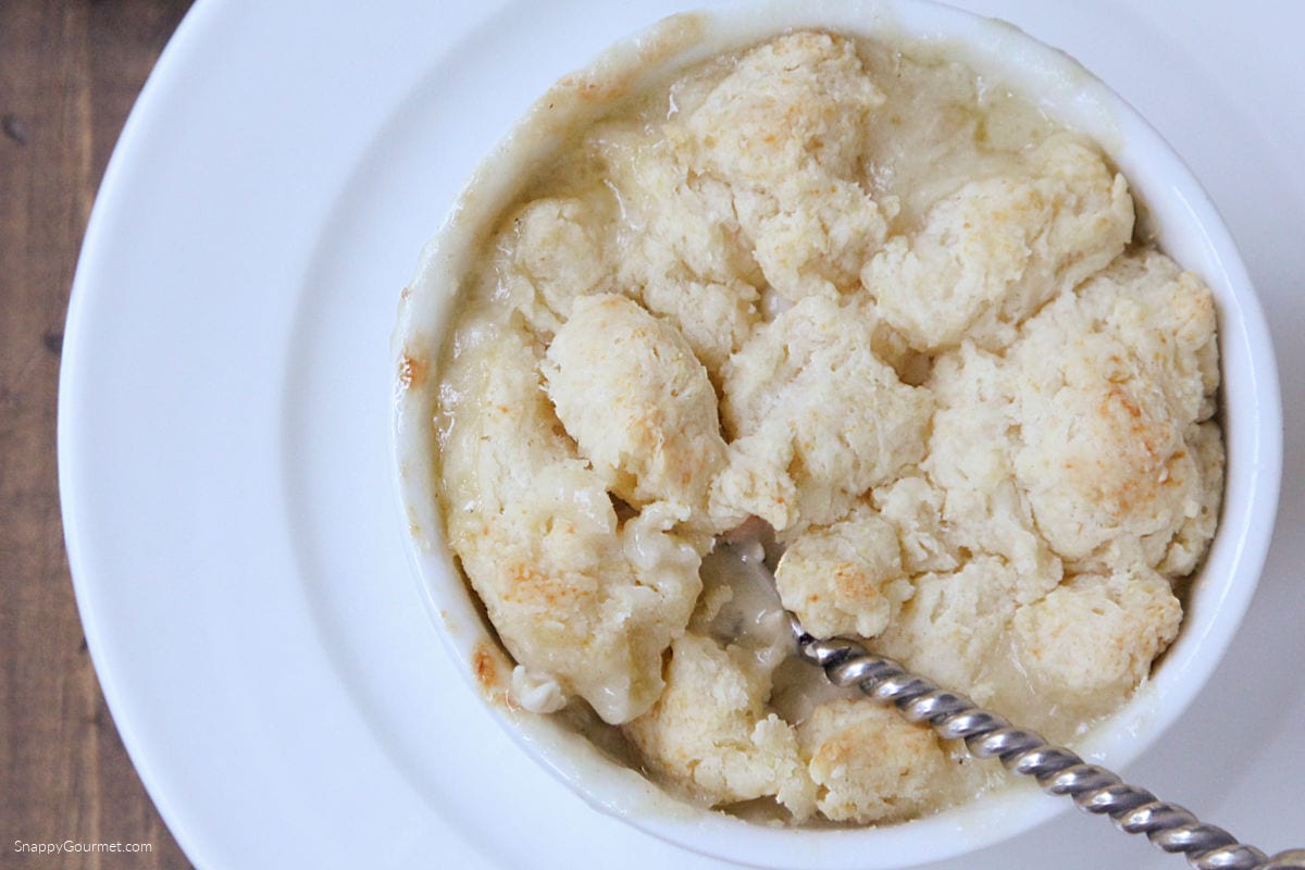 Individual Chicken Pot Pie on plate with spoon