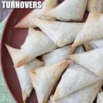 Spinach & Feta Phyllo Turnovers on plate with napkin on side