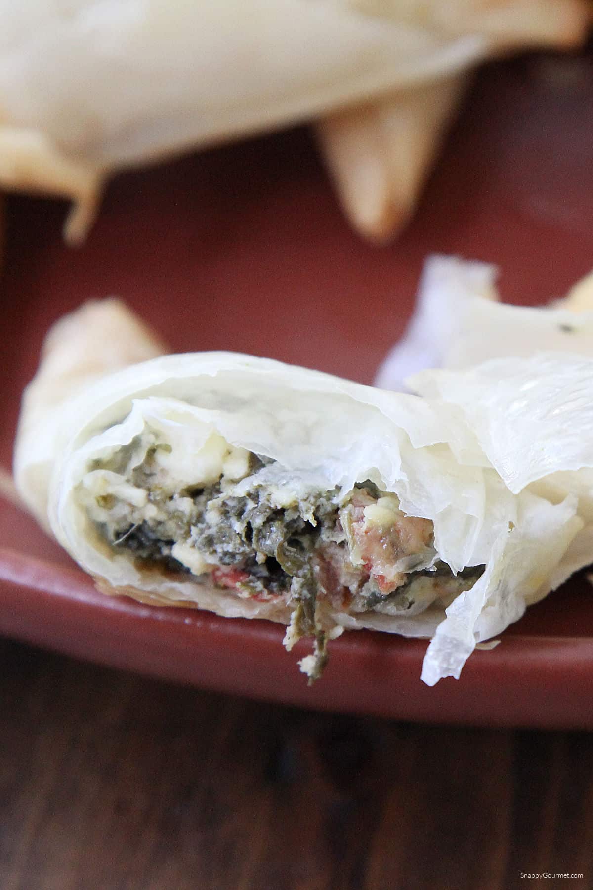 Spinach & Feta Phyllo Turnover on plate cut open