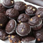 mini chocolate chocolate chip muffins on towel