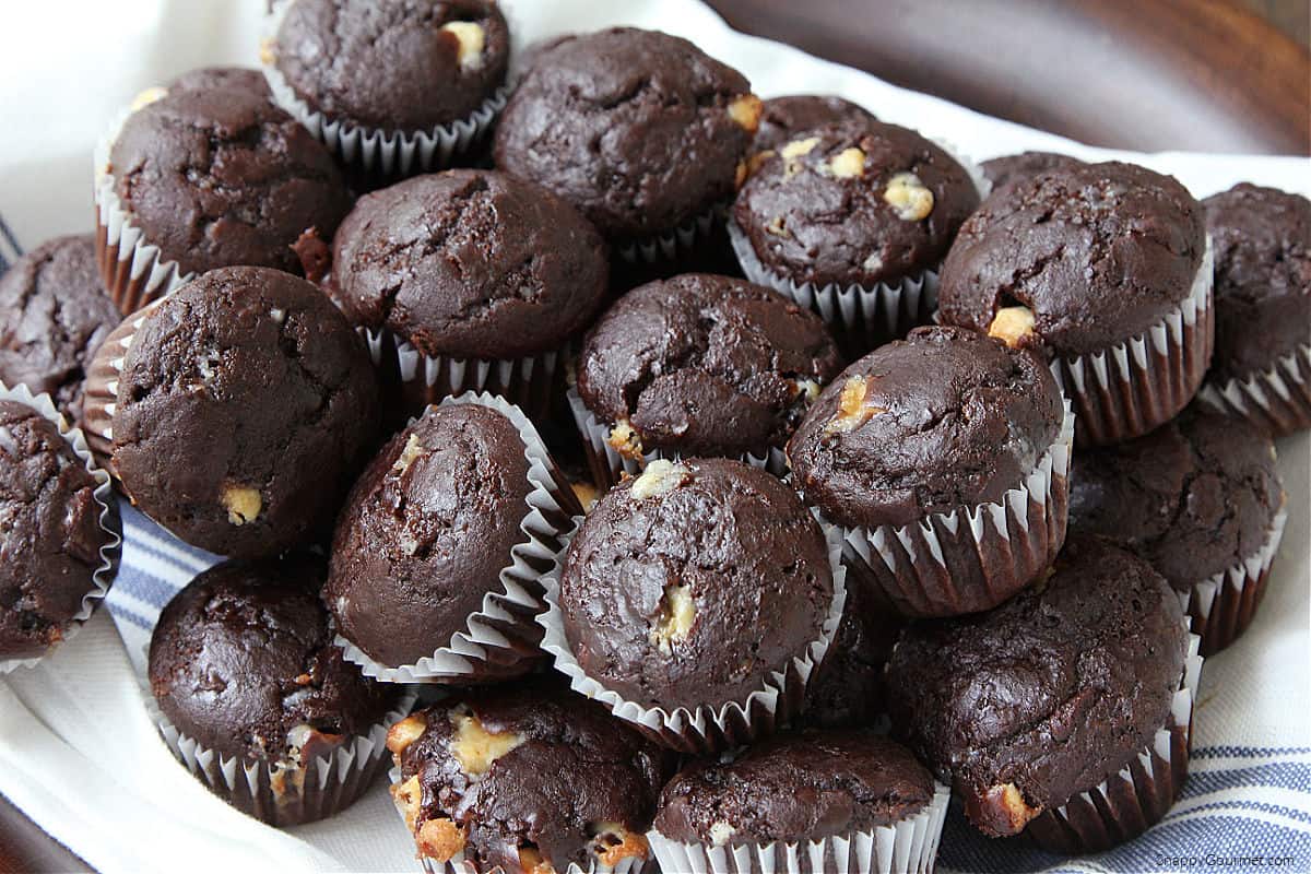 mini chocolate chocolate chip muffins on towel