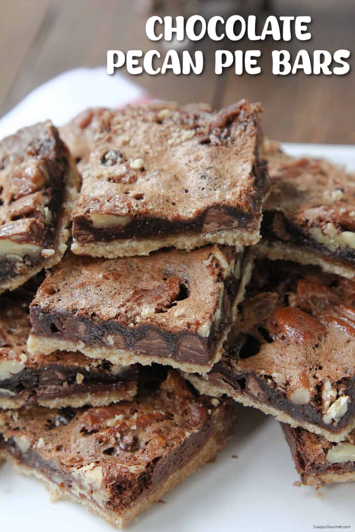 stack of Chocolate Pecan Pie Bars on plate
