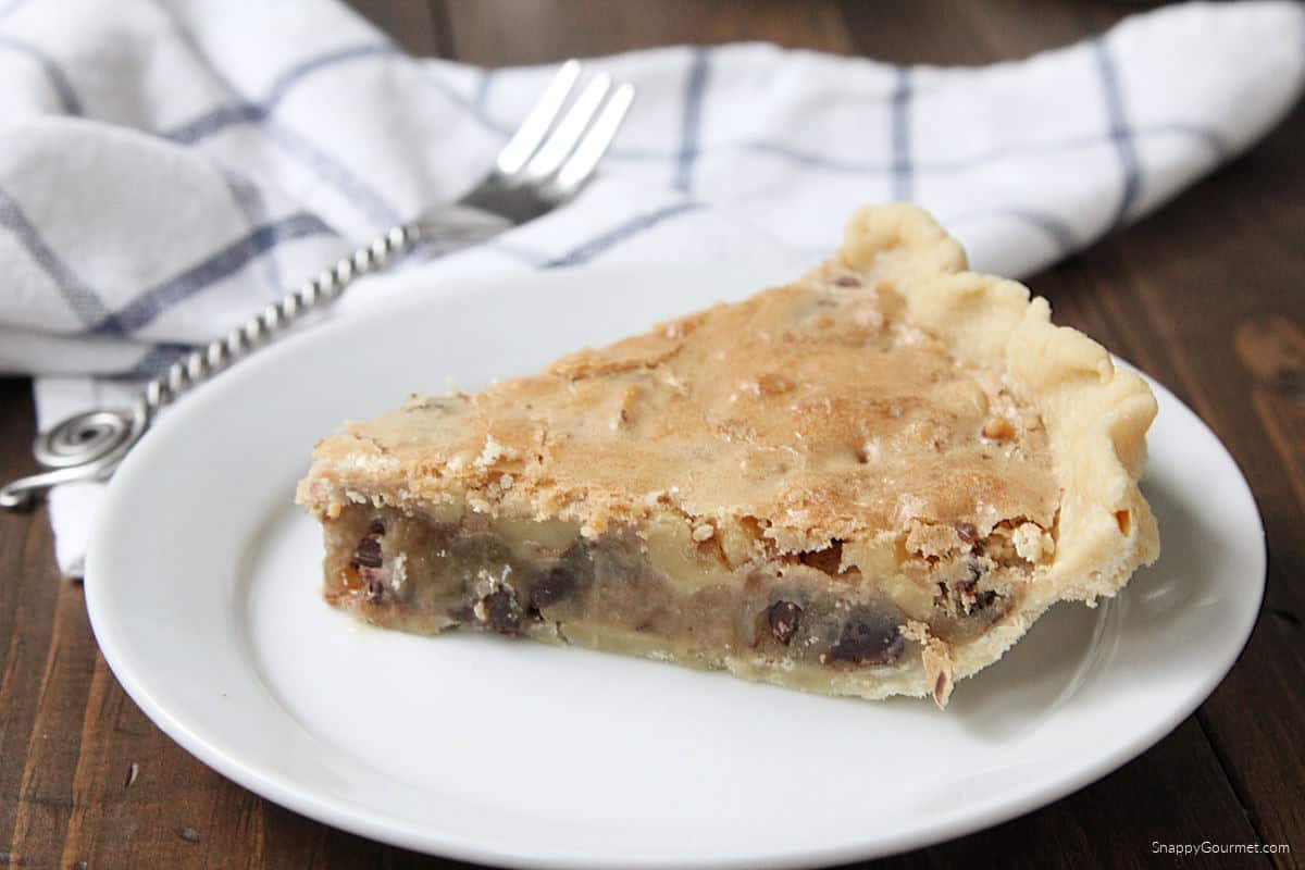 Chocolate Walnut Cookie Pie slice of Chocolate Walnut Cookie Pie on plate