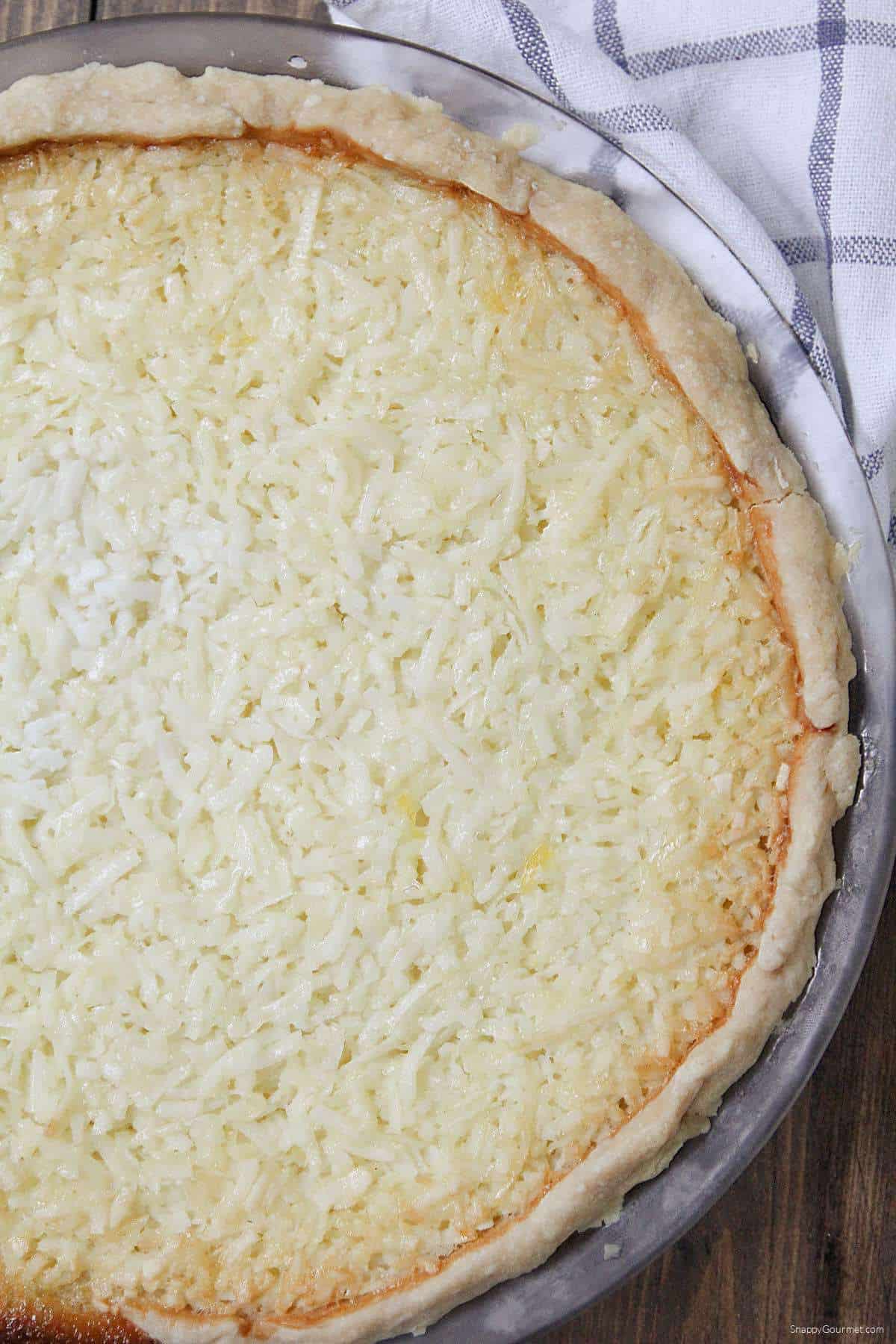 homemade Coconut Custard Pie in pie plate