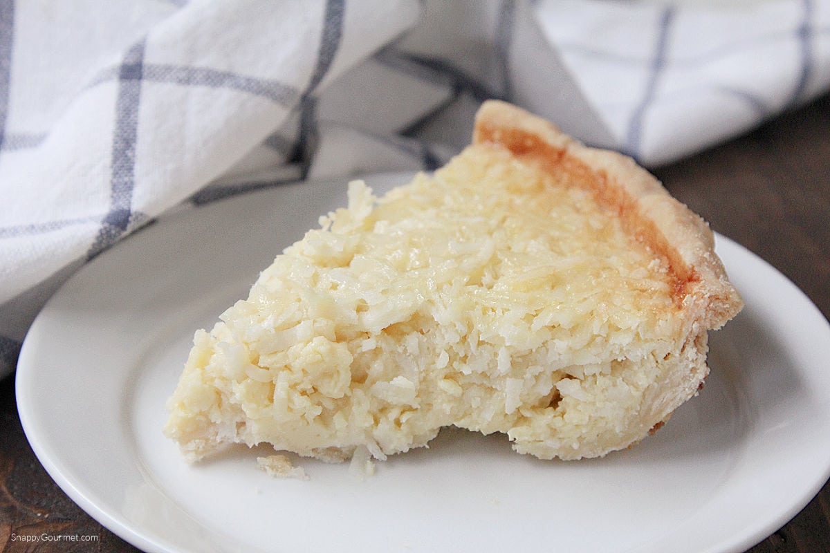 slice of homemade Coconut Custard Pie on plate