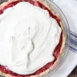 Fresh Strawberry Pie in pie plate on towel