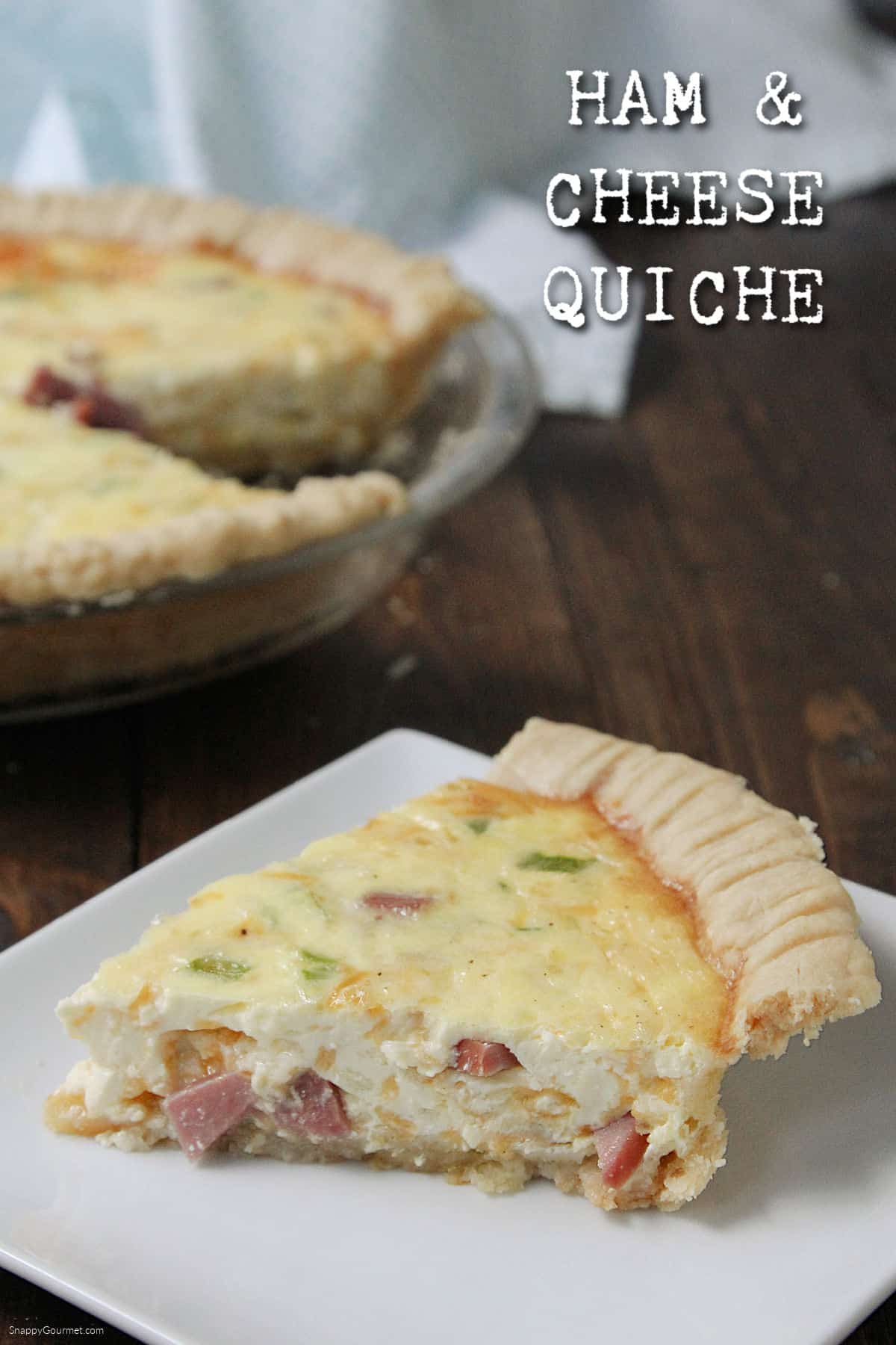 Ham and Cheese Quiche slice of Ham and Cheese Quiche on plate