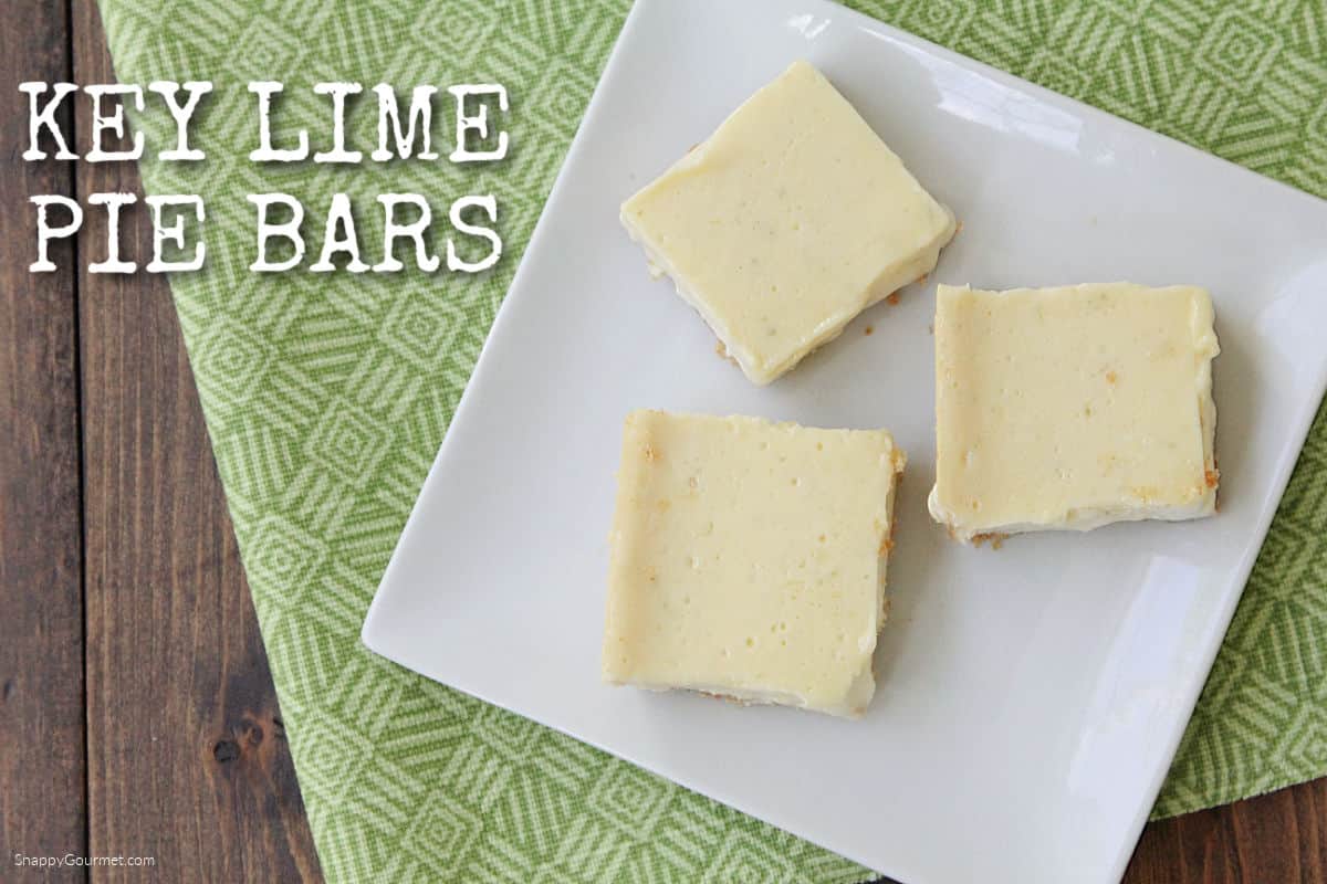 Key Lime Pie Bars on plate on top of towel