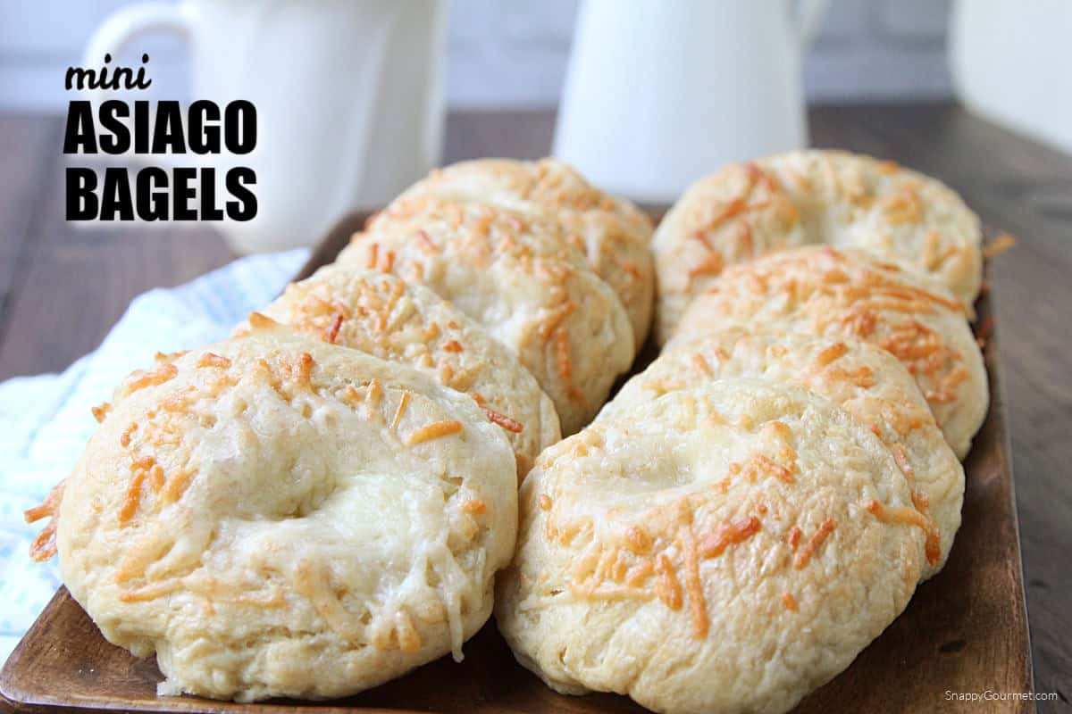 Mini Asiago Bagels on wood platter