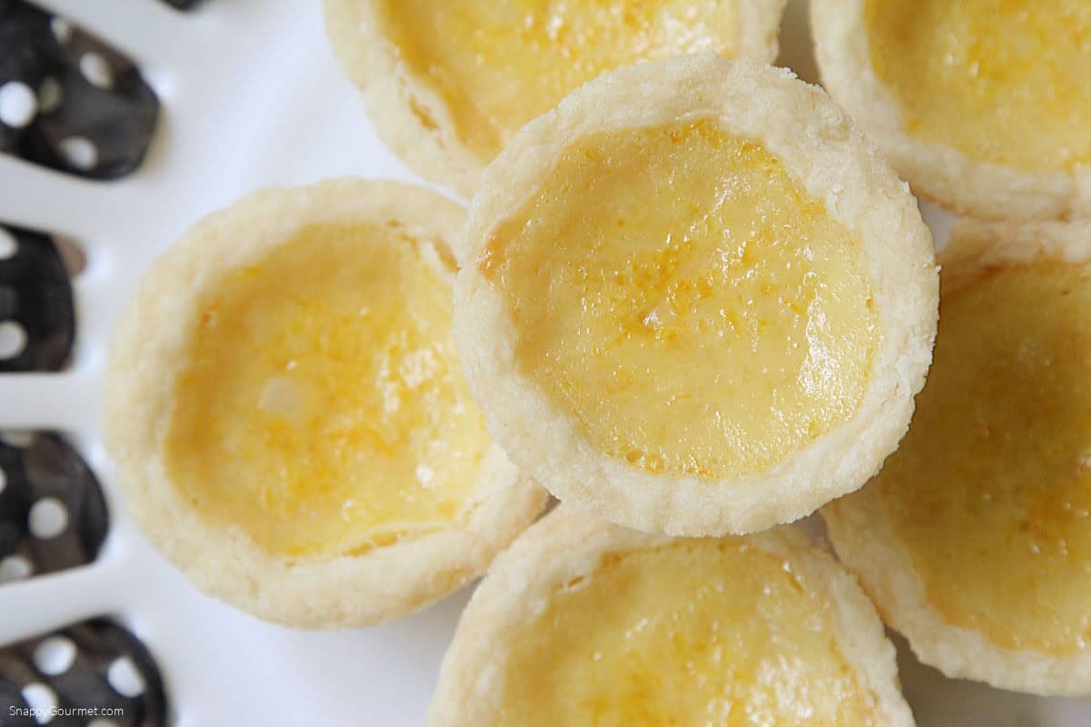 Mini Orange Pies cake stand topped with Mini Orange Pies