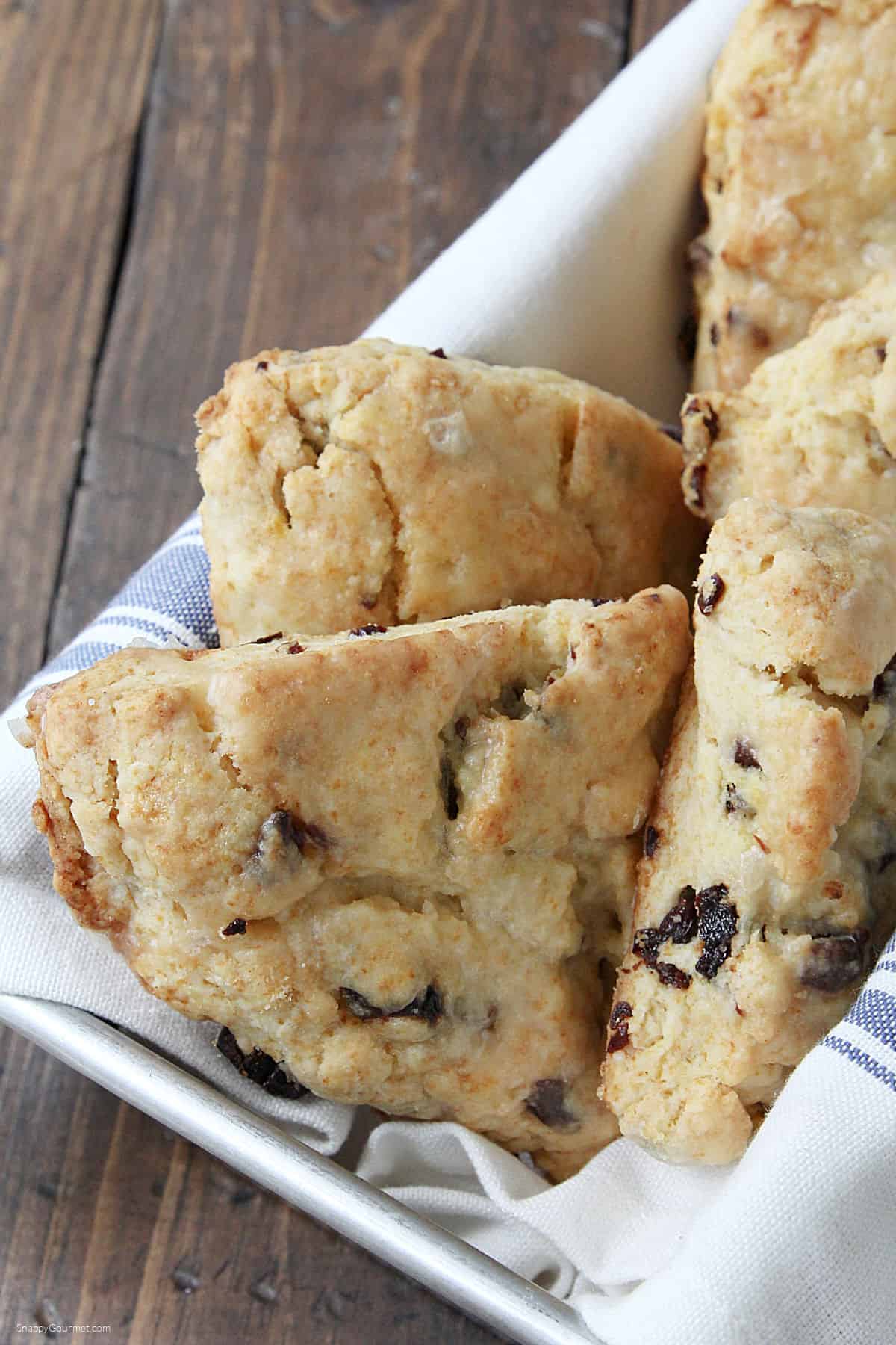 Orange Cherry Scones in basket with towel