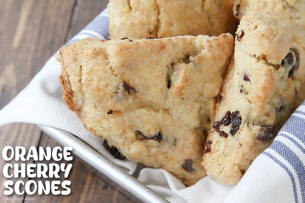 Orange Cherry Scones in basket with towel