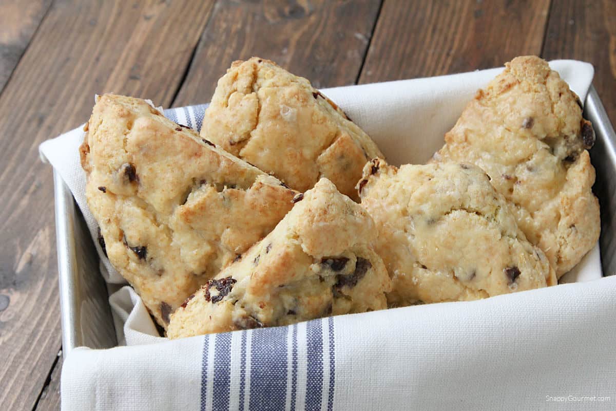 Orange Cherry Scones in basket with towel