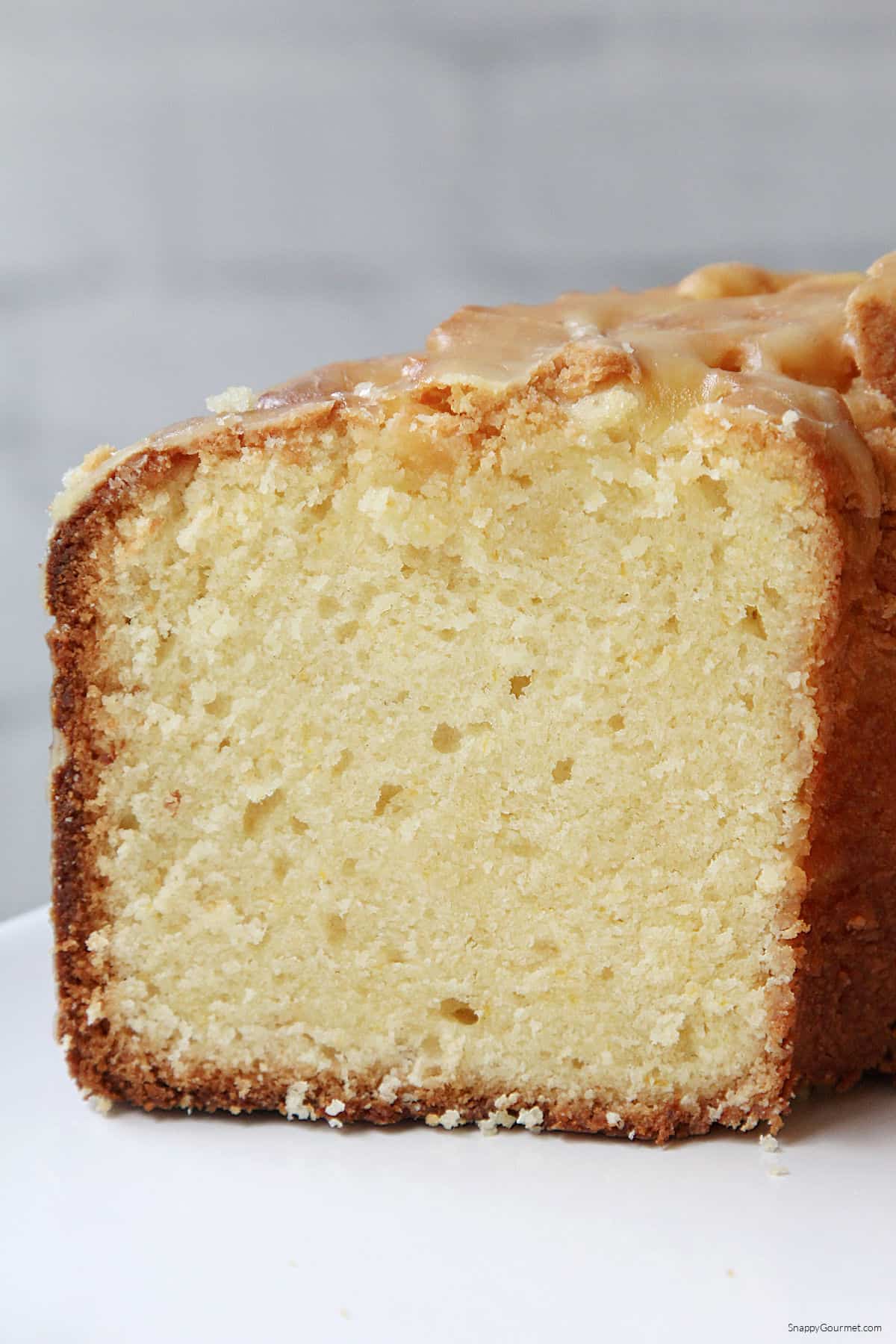 Orange Pound Cake on cake stand