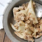 Pear Crisp in bowl with spoon