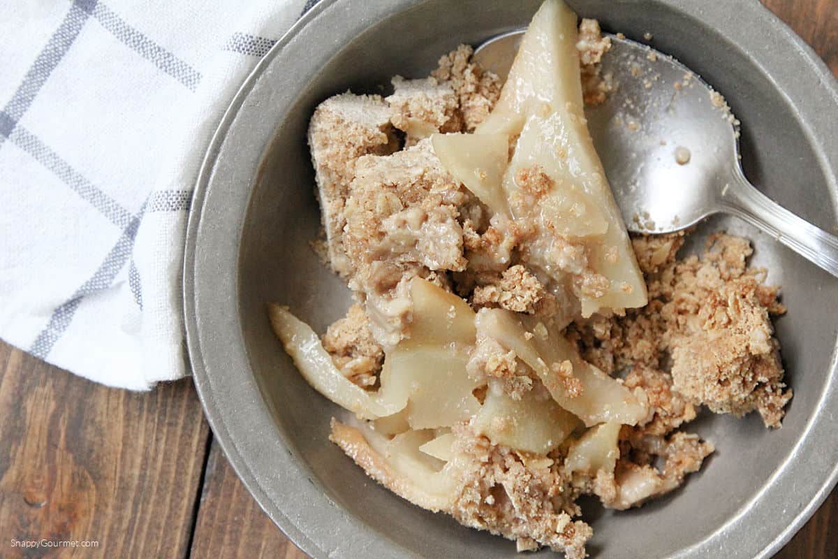 Pear Crisp in bowl with spoon