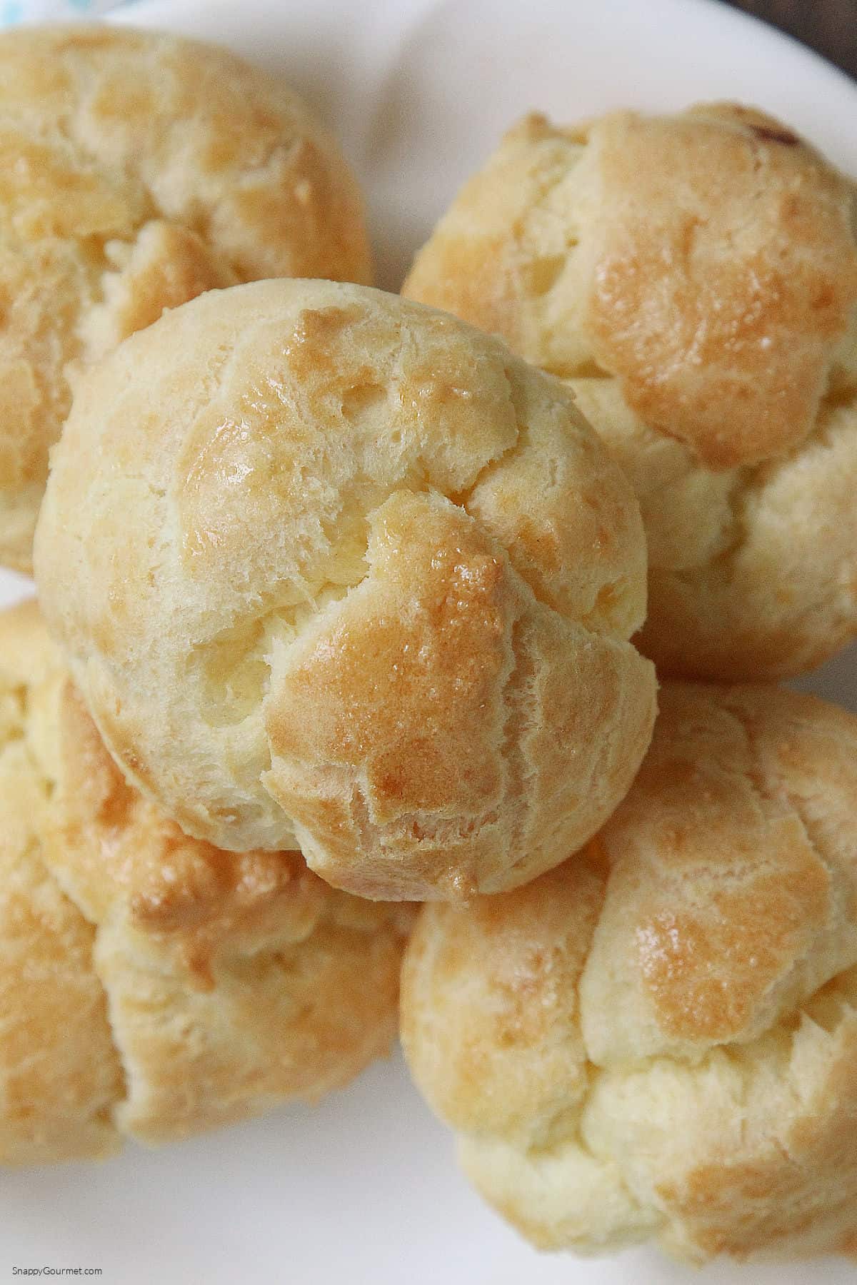 Profiteroles stacked on plate