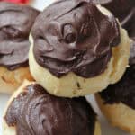 stack of chocolate dipped Profiteroles on plate