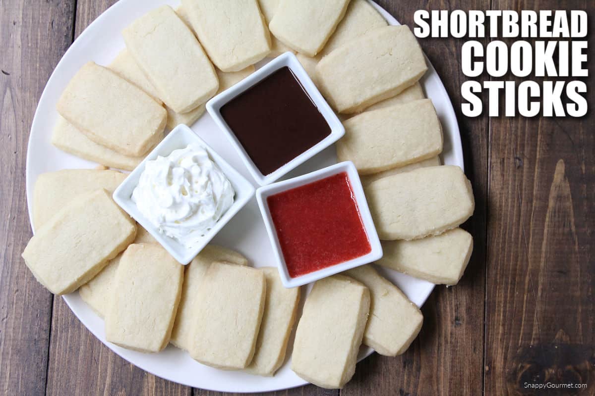 plate full of Shortbread Cookie Sticks and dipping sauces