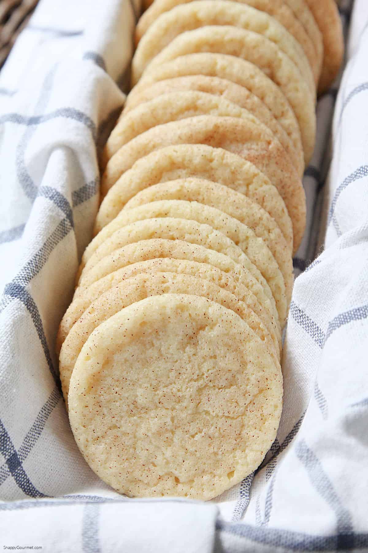 Snickerdoodle Cookies basket with towel topped with Snickerdoodle Cookies