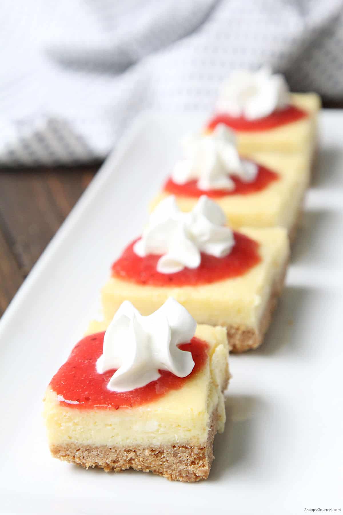 Strawberry Cheesecake Bars on platter