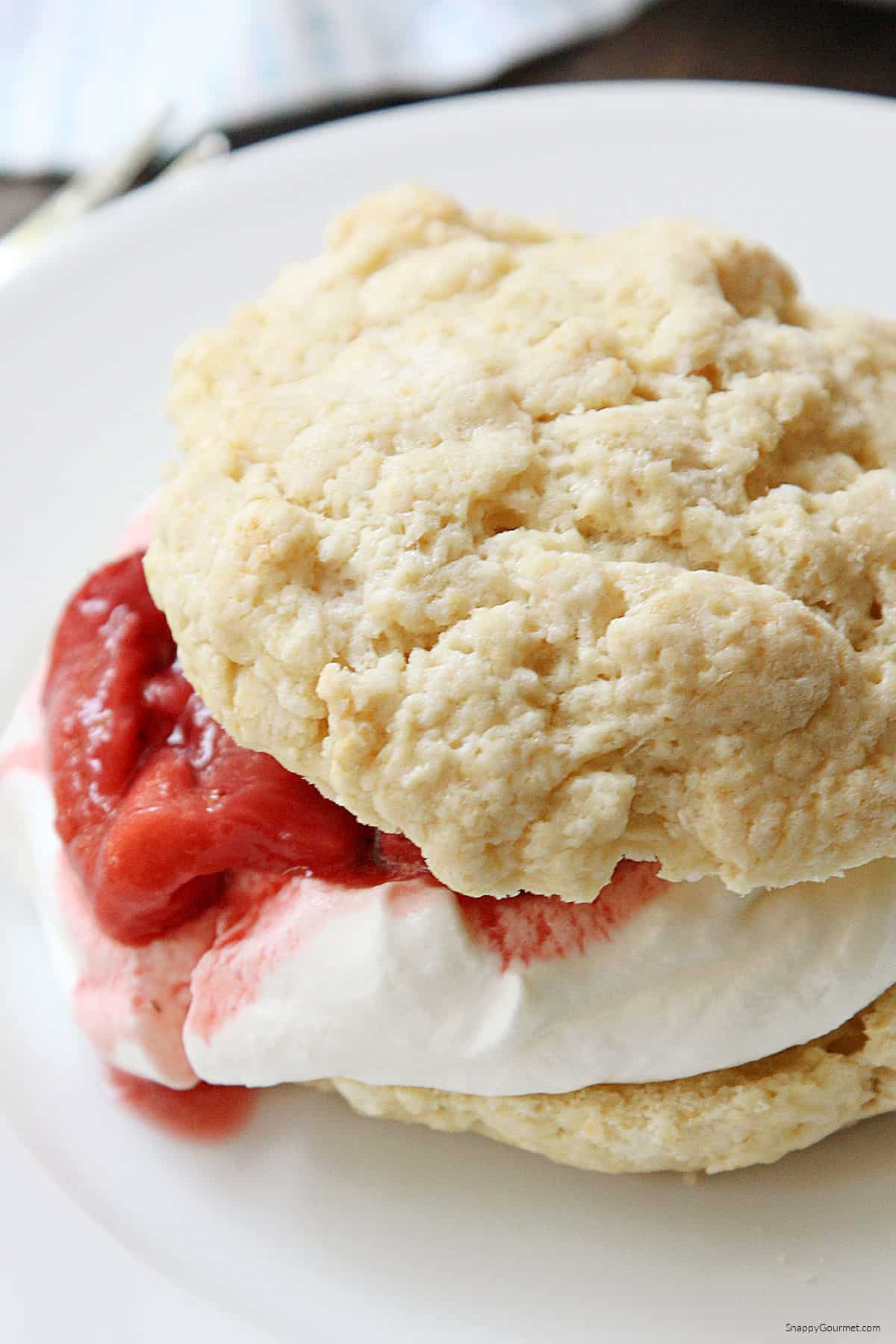 closeup of Strawberry Shortcake with Roasted Strawberries on plate