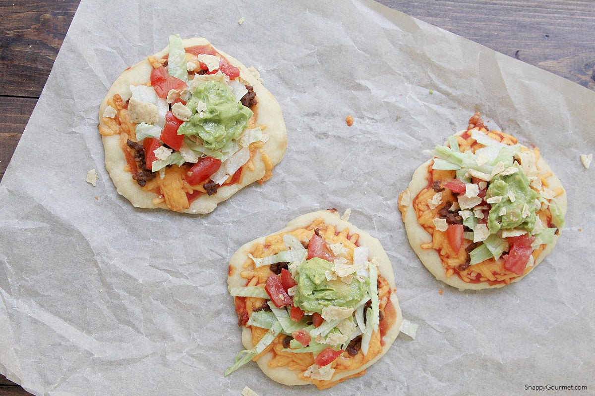 Taco Pizzas Taco Pizzas on parchment paper