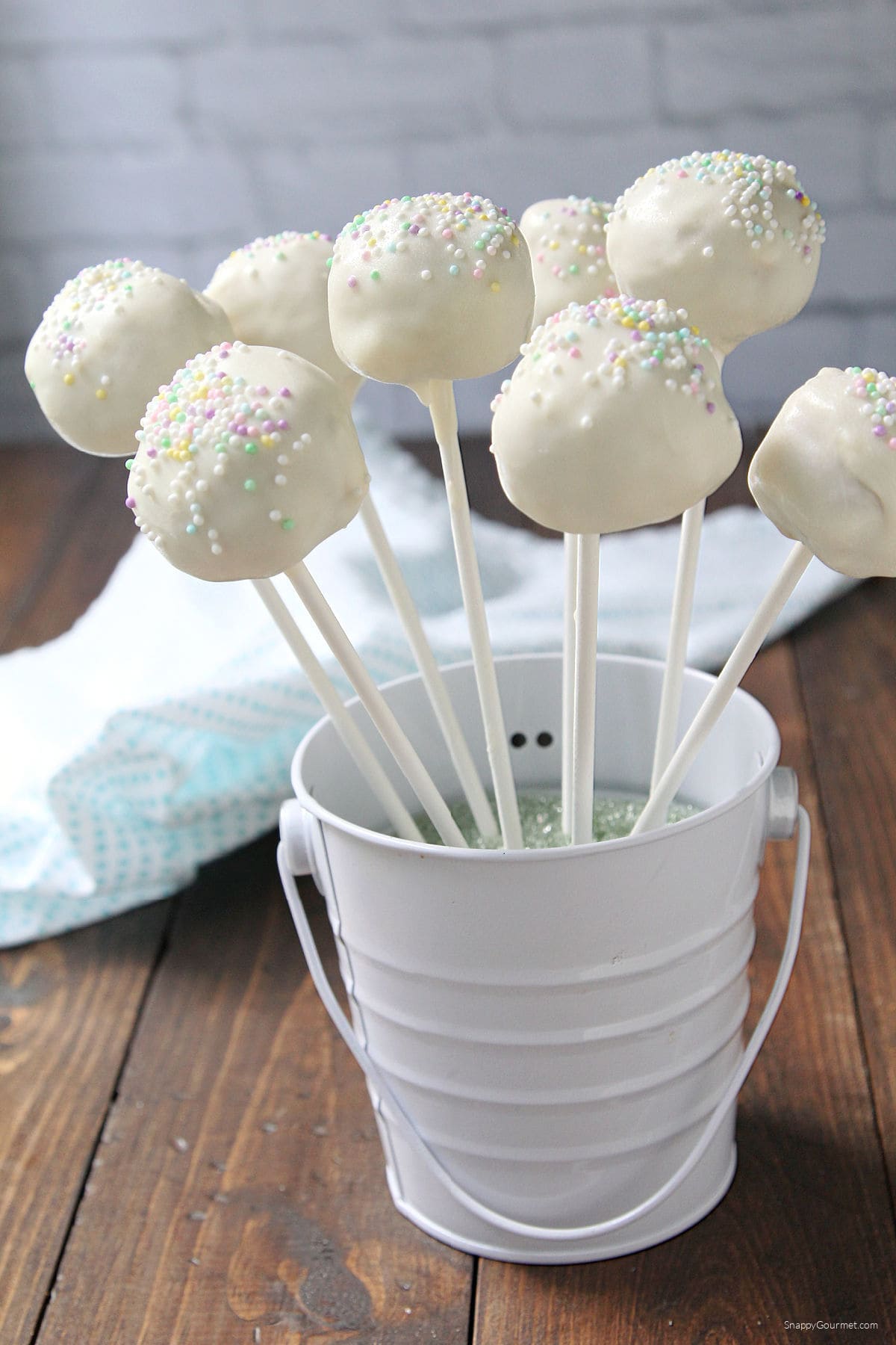 Vanilla Cake Pops Vanilla Cake Pops standing up in small bucket