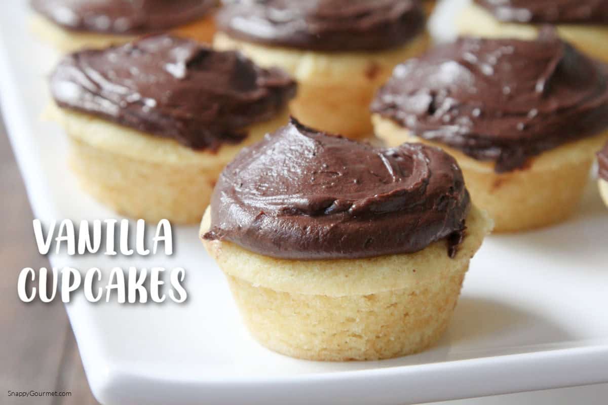 Vanilla Cupcakes Vanilla Cupcakes on cake stand
